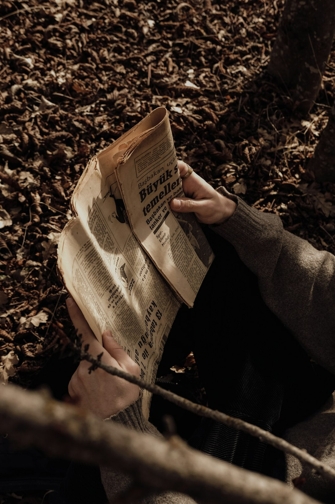 person reading old documents